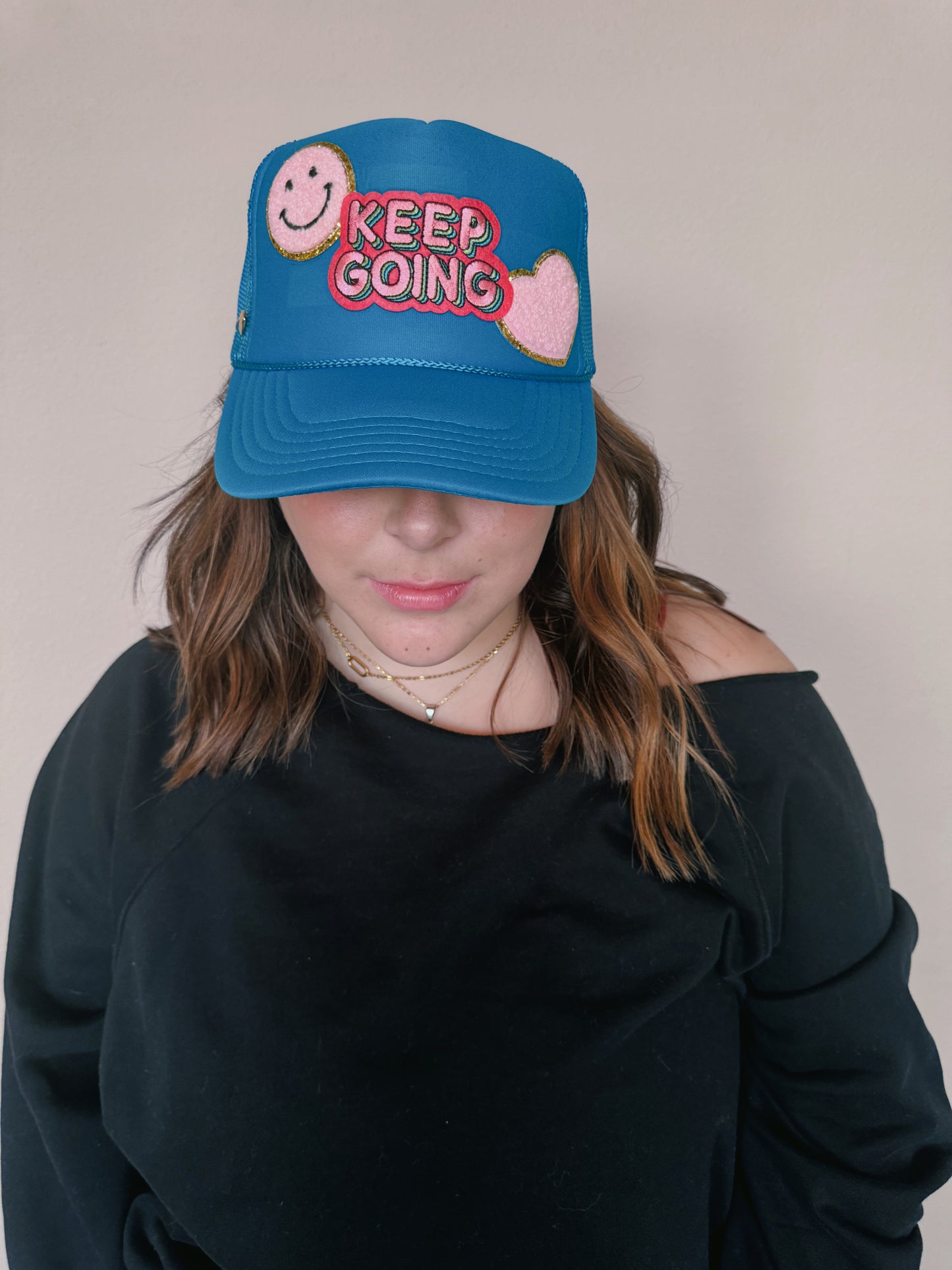 Keep Going Trucker Hat